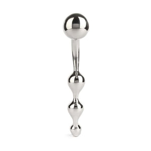 Wand Multi-Stim en acier inoxydable poli, forme incurvée avec extrémités sphériques, présenté sur fond blanc, sélection Brigade Mondaine Paris.