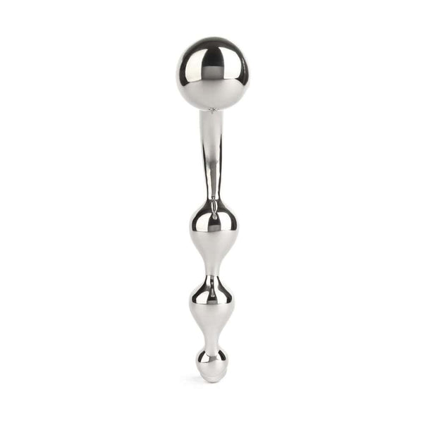 Wand Multi-Stim en acier inoxydable poli, forme incurvée avec extrémités sphériques, présenté sur fond blanc, sélection Brigade Mondaine Paris.