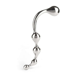 Wand Multi-Stim en acier inoxydable poli, forme incurvée avec extrémités sphériques, présenté sur fond blanc, sélection Brigade Mondaine Paris.