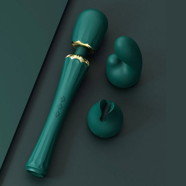 Wand Kyro Eden en silicone vert profond avec finitions dorées, présentée par Brigade Mondaine Paris, accessoire de stimulation au design élégant et contemporain.