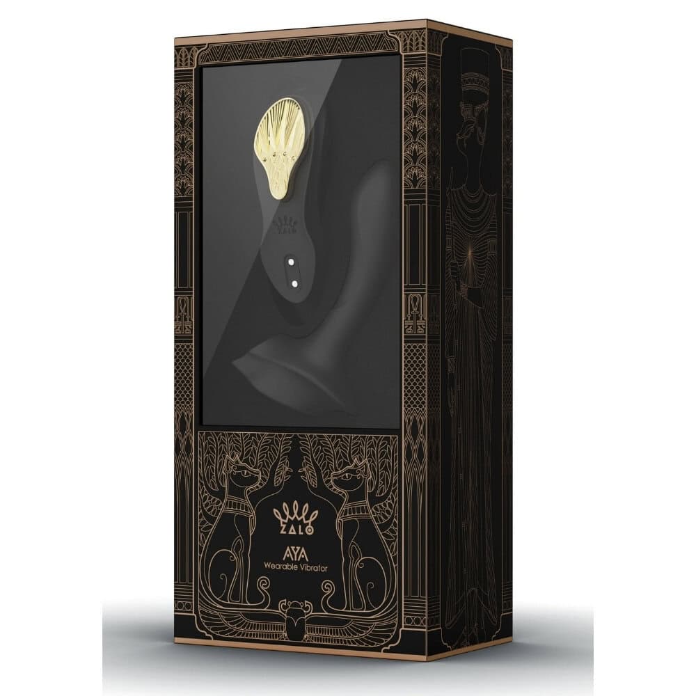 Vibromasseur portable de couleur noire avec détails dorés, design ergonomique et commandes intégrées, présenté sur fond blanc, sélection Brigade Mondaine Paris.
