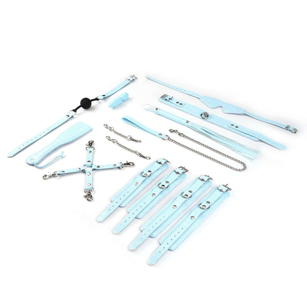 Kit de Bondage Macaron Bleu Menthe LIEBE SEELE, 9 pièces : bandeau, bâillon-boule, collier avec laisse, menottes poignets et chevilles, paddle, flogger, hogtie, mini masseur, similicuir bleu menthe avec finitions argentées.
