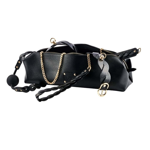 Trousse de rangement en cuir noir avec fermeture zippée et détails raffinés, accessoire de rangement sélectionné par Brigade Mondaine Paris.