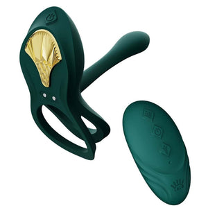 Vibromasseur portable au design ergonomique présenté avec son écrin, posé sur un décor aux nuances bleues et rouges, sélection Brigade Mondaine Paris. Sextoys Electriques