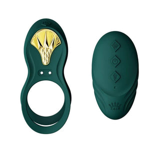 Vibromasseur portable au design ergonomique présenté avec son écrin, posé sur un décor aux nuances bleues et rouges, sélection Brigade Mondaine Paris. Sextoys Electriques