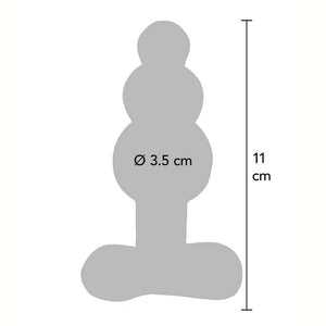 Plug anal en verre transparent à forme facettée avec base évasée, présenté sur fond clair, finition brillante, sélection Brigade Mondaine Paris.