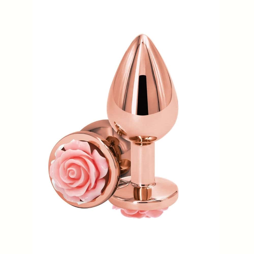 Plug anal en métal poli avec base décorative en forme de rose noire, posé sur fond blanc, sélection Brigade Mondaine Paris.
