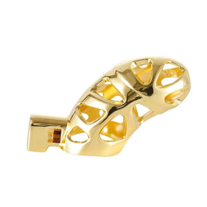 Cage de chasteté en métal doré poli avec anneau de fixation, présentée sur fond blanc, sélection Brigade Mondaine Paris.