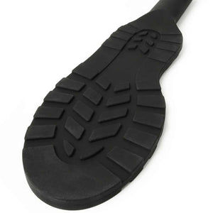Paddle noire texturée avec poignée ergonomique et surface structurée, accessoire BDSM proposé par Brigade Mondaine Paris.