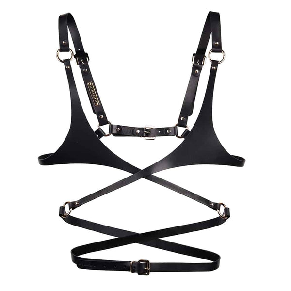 Soutien gorge en cuir noir de la marque Elif Domanic. Ce soutien gorge s’apparente presque à la forme d’un harnais grâce à ses tours de taille en cuir qui s’attache au niveau du nombril par le biais d’une fine boucle argenté. La poitrine est cachée par une pièce recouvrant une petite partie des seins. Cet ensemble est relié aux bretelles par deux anneaux argentés avec à l’arrière une lanière munie d’une boucle et de quelques clous. A l’intérieur de la bretelle de droite se trouve une plaquette argentée embo