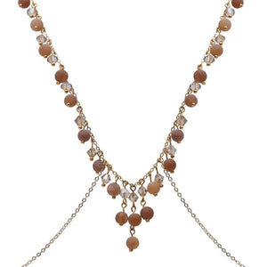 Détail du Packshot du Devant d'un Bijou de Buste Doré avec Bijoux Swarovski