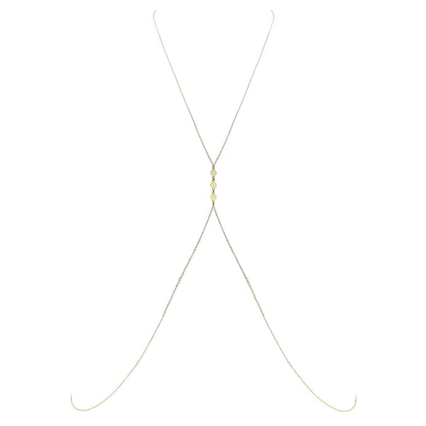 Bijou de corps en or dos nu avec petits ronds plats en or entre les seins FUNGI chez Brigade Mondaine