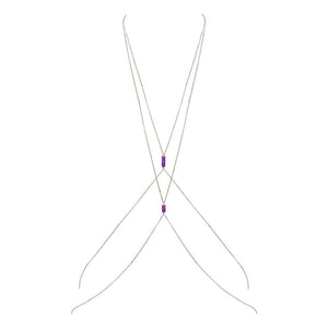 Bijou de corps avec croisement sur la poitrine et pierres violettes dos nu chez Brigade Mondaine