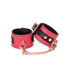 Packshot Menottes En Cuir Rose et Noir avec Attache Chaîne Rose Gold