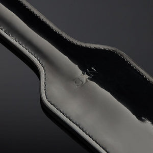 Packshot Paddle Cuir Vernis Noir