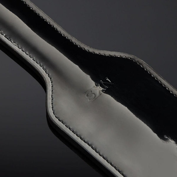 Packshot Paddle Cuir Vernis Noir