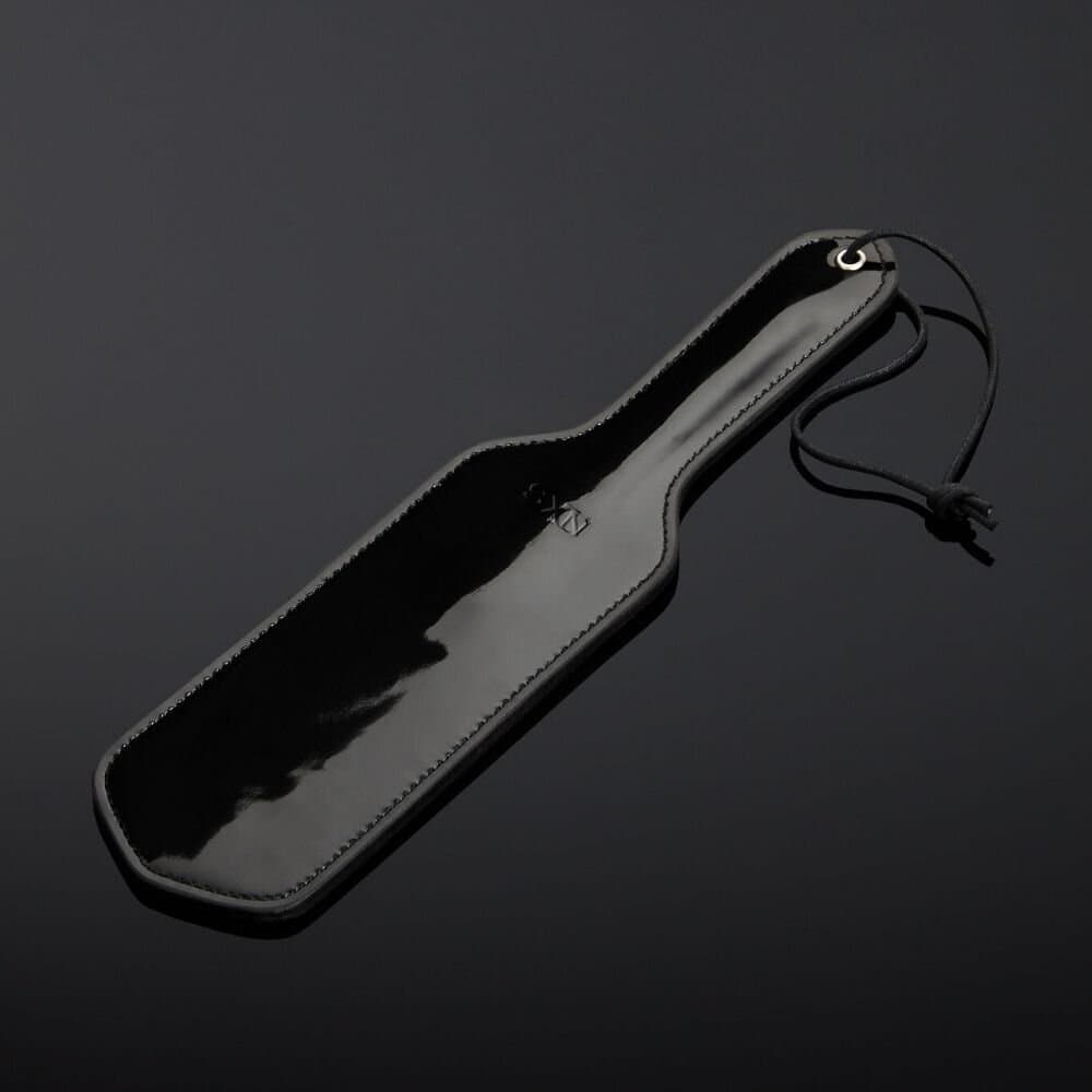 Packshot Paddle Cuir Vernis Noir