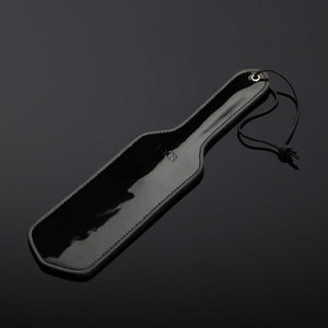 Packshot Paddle Cuir Vernis Noir