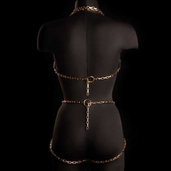 Culotte ouverte ARIA IINFYNII en cuir noir avec chaînes dorées et symbole infini, pièce graphique et structurée, sélection Brigade Mondaine Paris