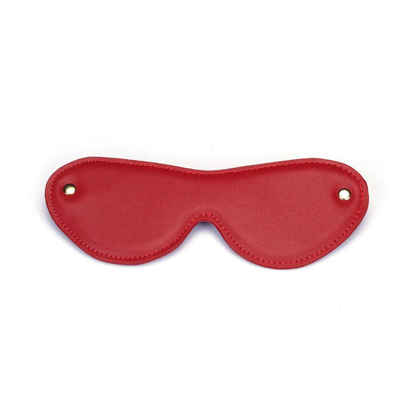 Bandeau Crimson Desire de la marque Liebe Seele, en cuir rouge avec sangle élastique assortie, présenté à plat sur fond clair dans l’univers Brigade Mondaine Paris.