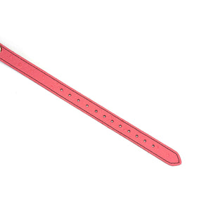Packshot Collier GAG en Cuir Rose et Boule en Silicone Noir Détail sur Sangle Attache en Cuir Rose