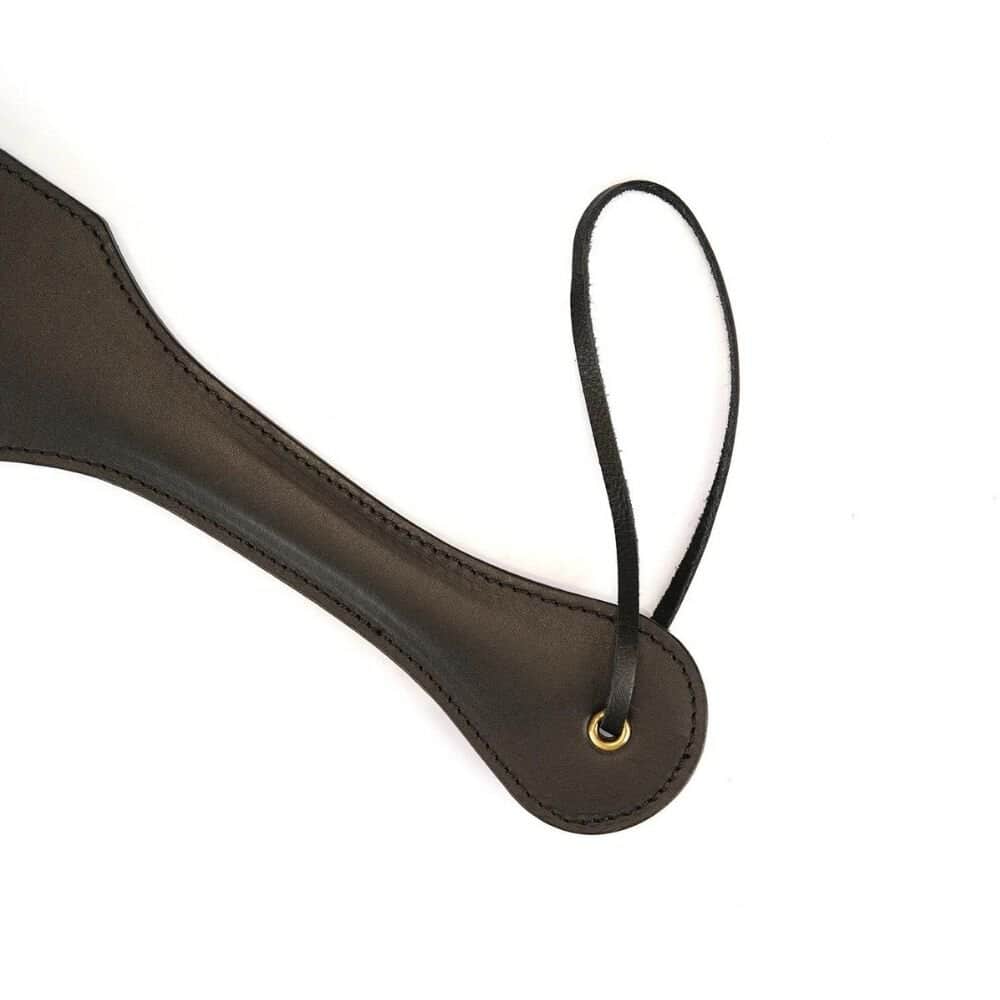 Détail du Manche du Packshot d'un Paddle en Cuir Marron