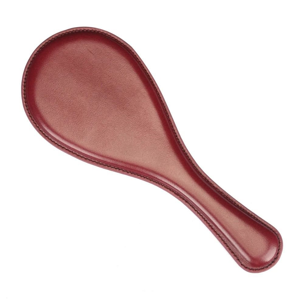 Packshot d'un Paddle Ovale en Cuir Rouge