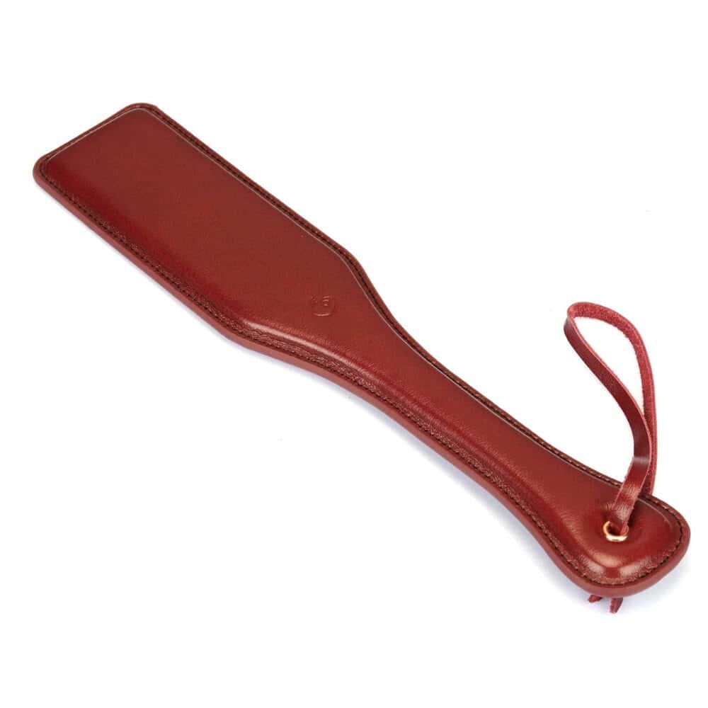 Packshot d'un Paddle en Cuir Rouge
