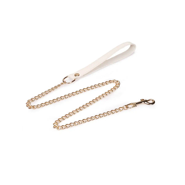 Collier laisse Boudoir Amor de la marque Liebe Seele, en cuir clair avec intérieur contrasté et chaîne métallique dorée, présenté à plat sur fond clair dans l’univers Brigade Mondaine Paris.