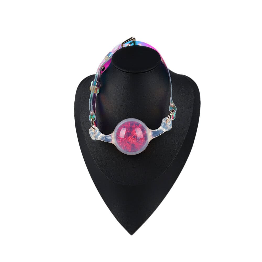 Bâillon-Boule Cristal LIEBE SEELE avec boule rose translucide en silicone et sangle irisée ajustable. Un accessoire chic et provocant pour une expérience de jeu silencieuse et agréable.