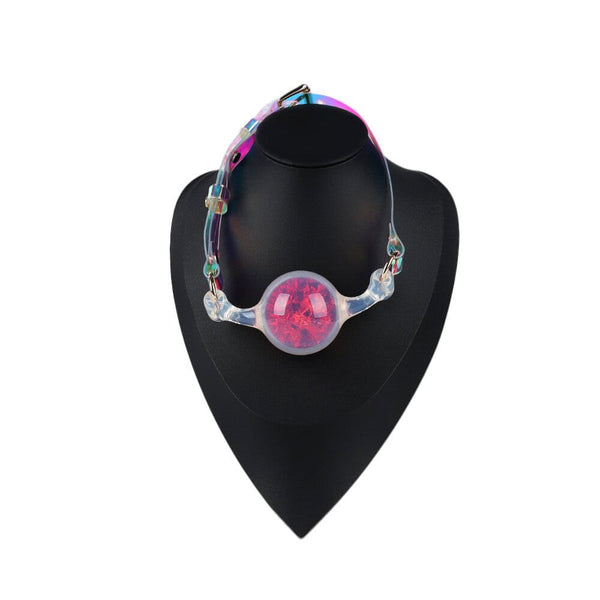 Bâillon-Boule Cristal LIEBE SEELE avec boule rose translucide en silicone et sangle irisée ajustable. Un accessoire chic et provocant pour une expérience de jeu silencieuse et agréable.