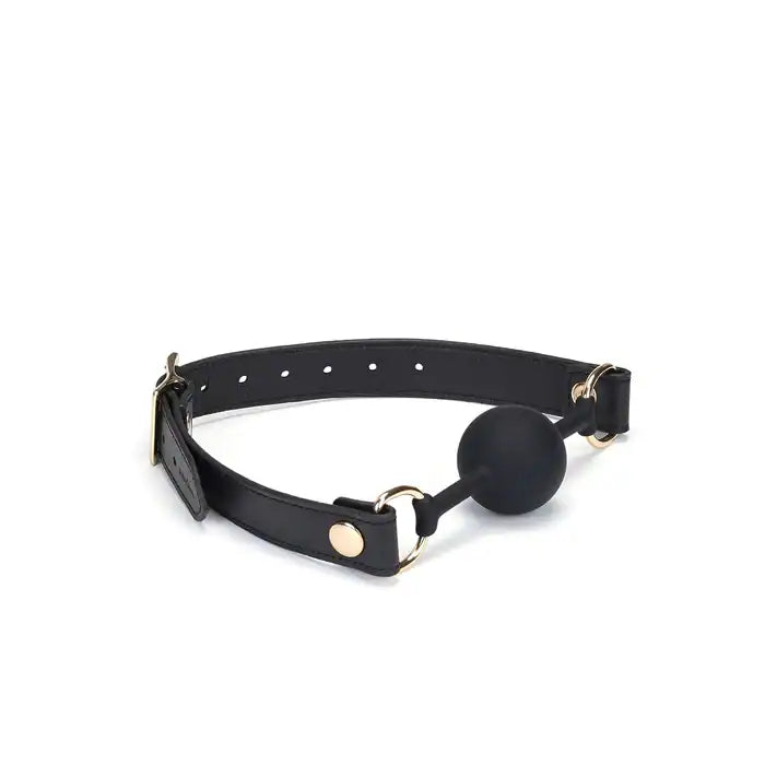Bâillon Boule GAG en Cuir noir lisse avec boule en silicone sangle réglable détail en métal Doré