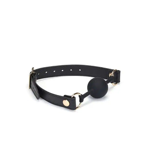 Bâillon Boule GAG en Cuir noir lisse avec boule en silicone sangle réglable détail en métal Doré