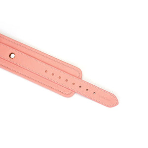 Packshot Menottes Chevilles Rose en Cuir détail Sangle D'Attache