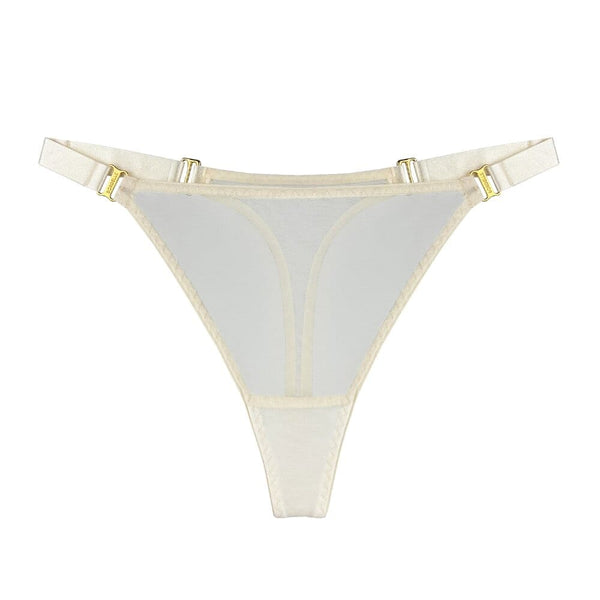 String BORDELLE Mesh Cream porté en vue rapprochée, en tulle ivoire transparent avec ceinture elastique fine et finitions métalliques dorées, présenté chez Brigade Mondaine Paris.