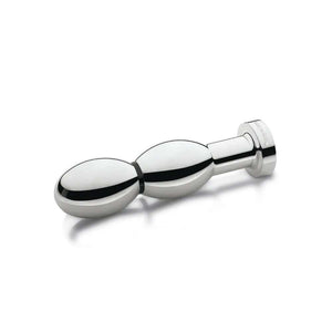 Plug électrostimulant OhThello en métal poli, design ergonomique et finition brillante, présenté sur fond clair, sélection Brigade Mondaine Paris.