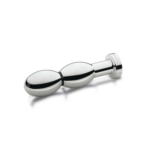 Plug électrostimulant OhThello en métal poli, design ergonomique et finition brillante, présenté sur fond clair, sélection Brigade Mondaine Paris.