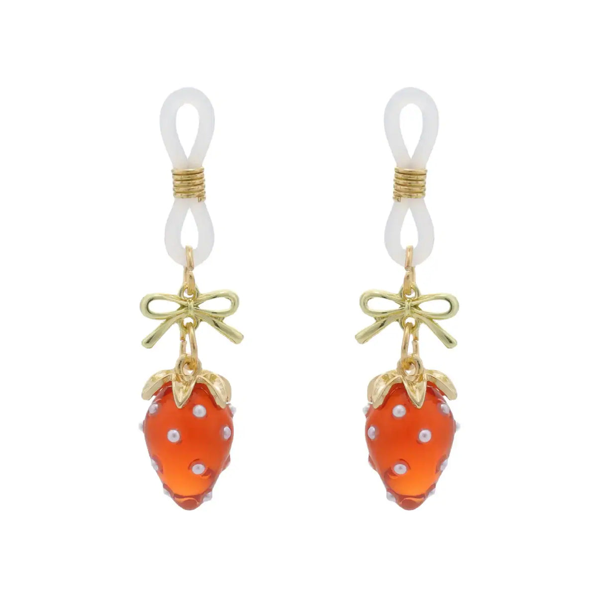 Pinces pour tétons Fraises de la marque Liebe Seele, ornées de breloques fraise rouges translucides et d’éléments dorés, présentées sur fond clair dans l’univers Brigade Mondaine Paris.