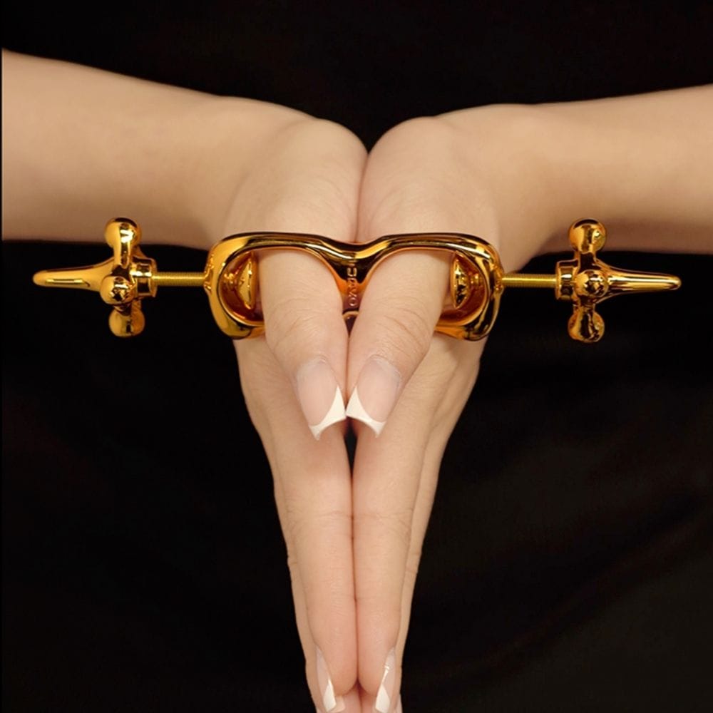 Menottes BDSM Pour Pouces mécanisme à vis progressif Finitions Dorées