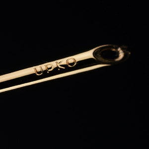 Candle wax scraper UPKO utilisé pour retirer la cire de bougie, accessoire BDSM présenté chez Brigade Mondaine Paris