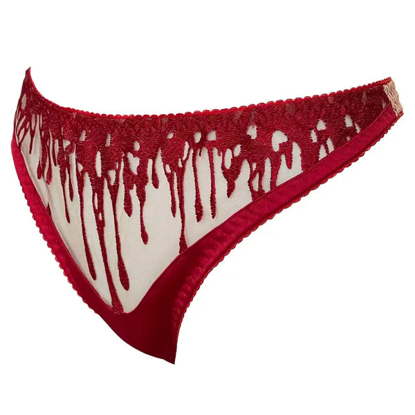 String CRIMSON VIDE NOIR présenté chez Brigade Mondaine Paris, string rouge en tulle transparent brodé de motifs gouttes stylisées, finitions délicates et coupe épurée.