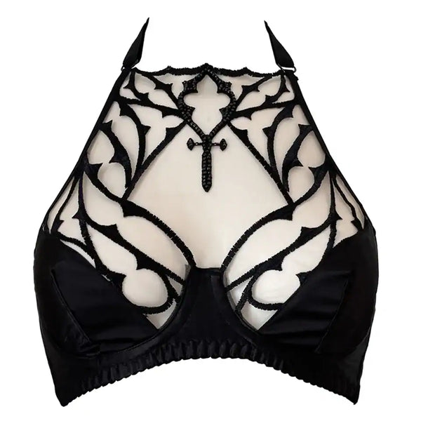 Soutien-gorge gothique en tulle nude brodé noir avec perles facettées. Demi-bonnets en satin noir doublé et col licou réglable. Élégance dramatique et maintien confortable.