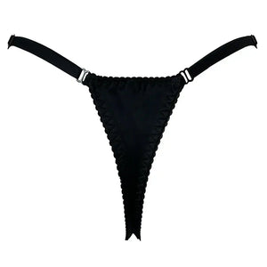 String Cathédrale Brodé VIDE NOIR présenté chez Brigade Mondaine Paris, string noir en tulle transparent orné de broderies graphiques d’inspiration gothique, finitions couture et coupe minimaliste.