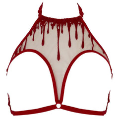 Harnais CRIMSON VIDE NOIR présenté chez Brigade Mondaine Paris, harnais rouge en tulle brodé avec motifs de gouttes stylisées, sangles réglables et structure ajourée au rendu couture.