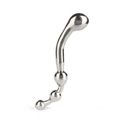 Wand Multi-Stim en acier inoxydable poli, forme incurvée avec extrémités sphériques, présenté sur fond blanc, sélection Brigade Mondaine Paris.
