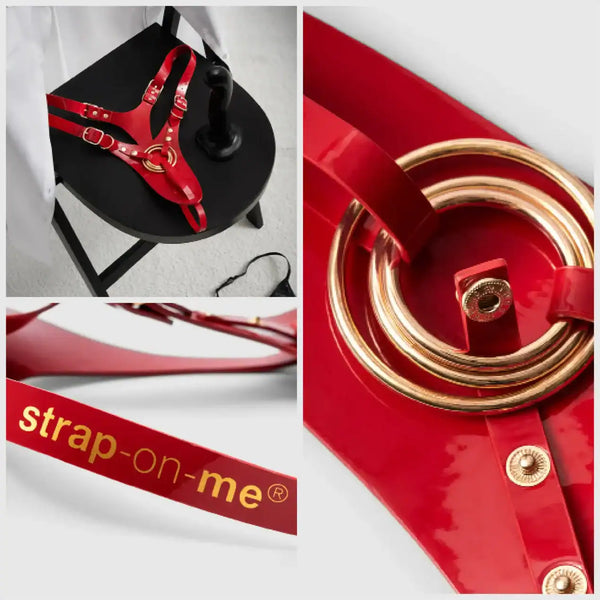 Harnais de pegging STRAP-ON-ME en cuir rouge avec anneau central doré et sangles réglables, sélection Brigade Mondaine Paris.