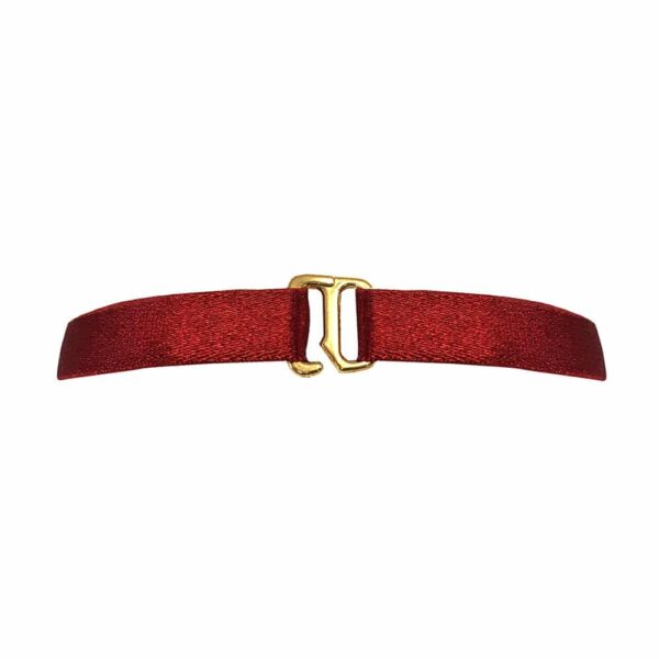 Red satin elastic necklace with a golden metal piece representing an interlacing of rings in its center, Bordelle Signature at Brigade Mondaine