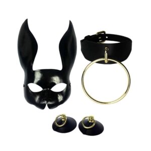 set consisting of a black bunny mask, a choker with 24-carat rings, black cone-shaped nippies with 24-carat rings. at brigade mondaine