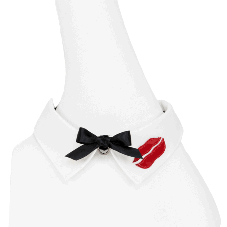 French Kiss necklace by Fraulein Kink on Brigade Mondaine. Ivory satin shirt collar necklace, lipstick leather details and hand-tied black satin bow. The entire French Kiss collection is handmade to order in the designer's Berlin atelier. This collection is inspired by French luxury with accessories that represent the fashion capital, Paris. Fraulein kink offers couture pieces that you won't see anywhere else.