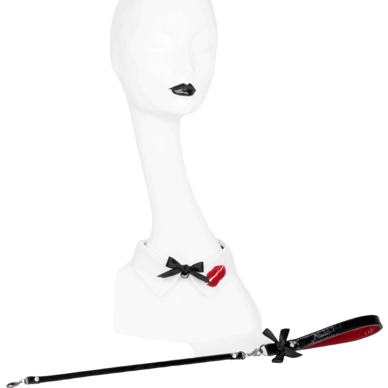 White collar and leash set in black and red patent leather from the French Kiss collection by Fraulein Kink, available at Brigade Mondaine